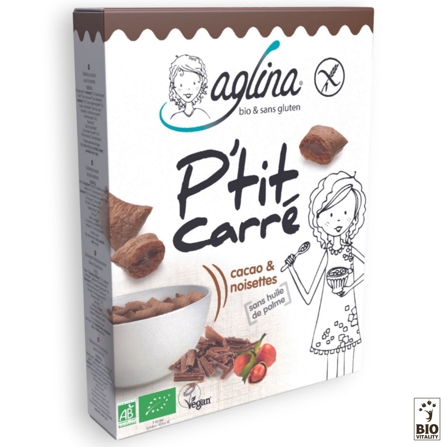 La boîte de céréales Ptit Carré cacao & noisettes Bio dAglina propose un délicieux goût de cacao et de noisette, labellisée vegan et sans gluten, sans huile de palme. Lemballage met en scène un enfant tenant joyeusement un bol sur le devant.