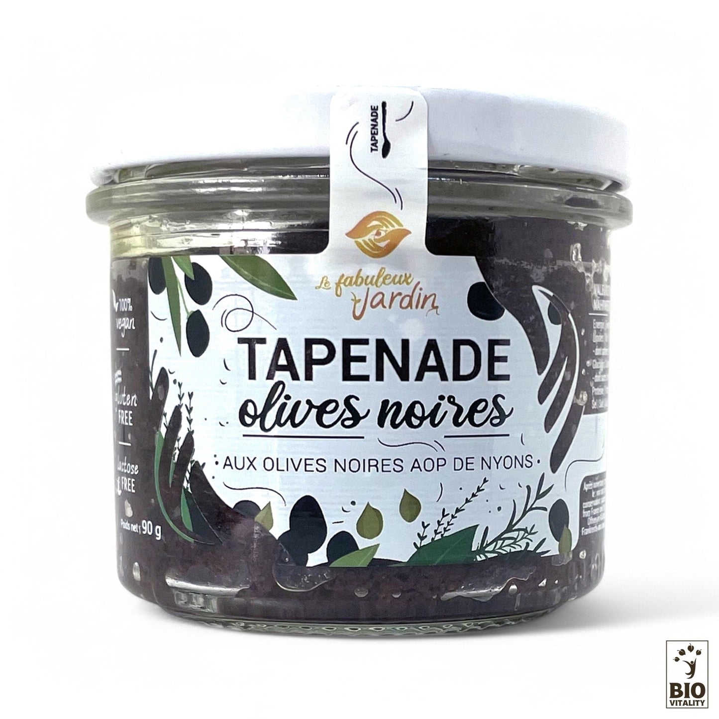 La Tapenade Olives noir Bio - 90g de FABULEUX JARDIN, surmontée dun couvercle blanc au motif dolives noires, offre 90g de tapenade dolives noires vegan et sans gluten, idéale pour ceux qui apprécient lauthenticité et le goût raffiné.