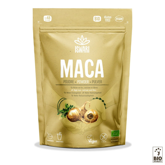 Le paquet beige de « ISWARI Maca en Poudre Bio » met en valeur les illustrations de racines de maca et se présente comme un superaliment biologique, sans gluten et végétalien. Il contient divers nutriments et arbore fièrement le logo de certification biologique européenne. Disponible en formats 125 g, 250 g et 1 kg.