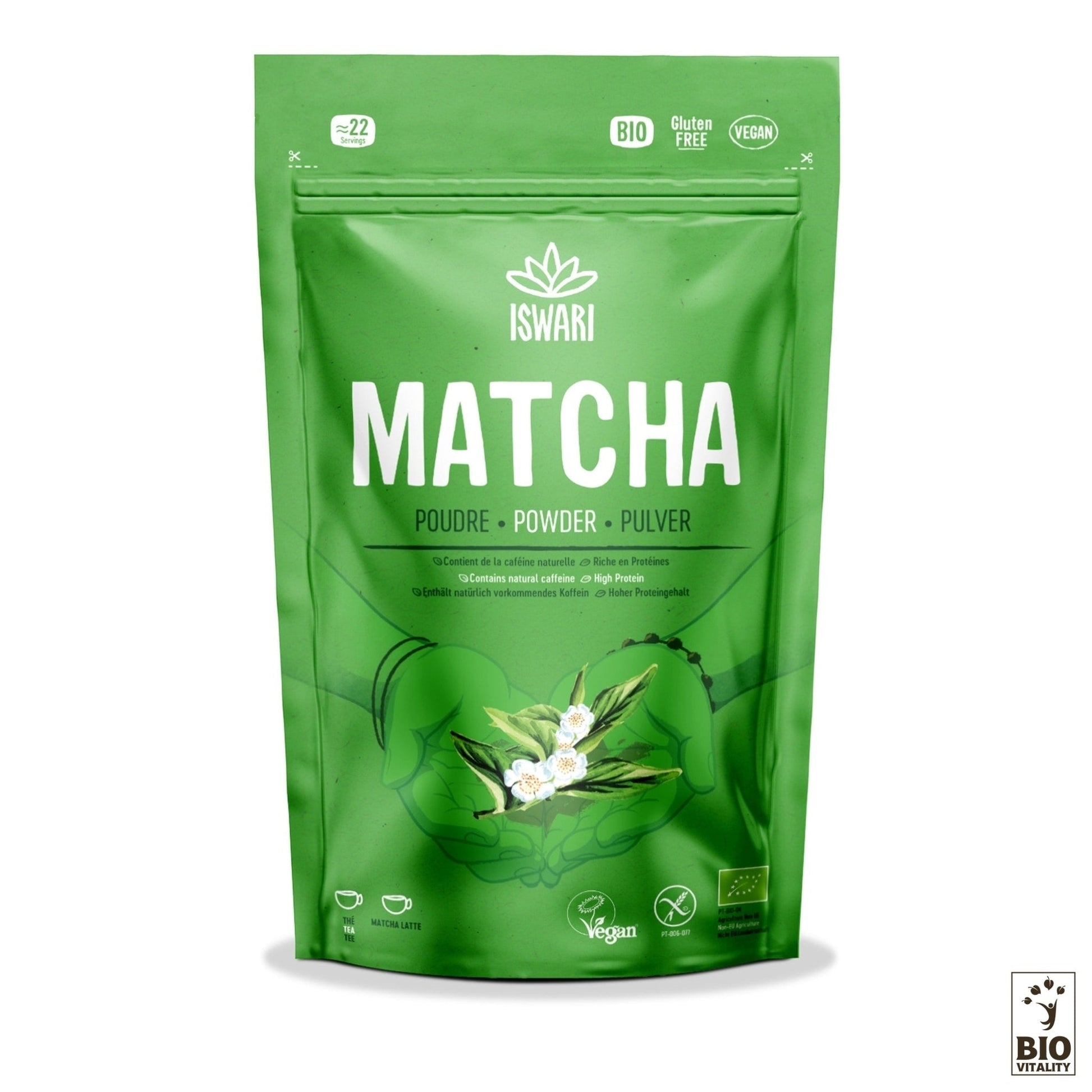Un sachet vert de Matcha en Poudre Bio dISWARI présente des fleurs blanches sur le devant. Il est étiqueté comme biologique, sans gluten et végétalien. Savourez les riches bienfaits du thé vert japonais authentique, riche en antioxydants puissants. Disponible en formats de 70 g à 1 kg.