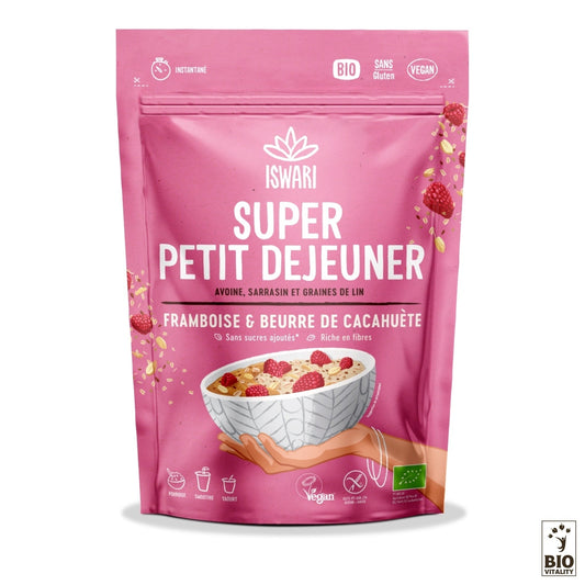 Le sac rose Iswari Super Petit Déjeuner Framboise et Cacahuète Bio contient des framboises et un bol, étiquetés biologique, végétalien et sans gluten avec des ingrédients comme des flocons davoine sans gluten, du sarrasin, des graines de lin, des framboises et du beurre de cacahuète croquant.