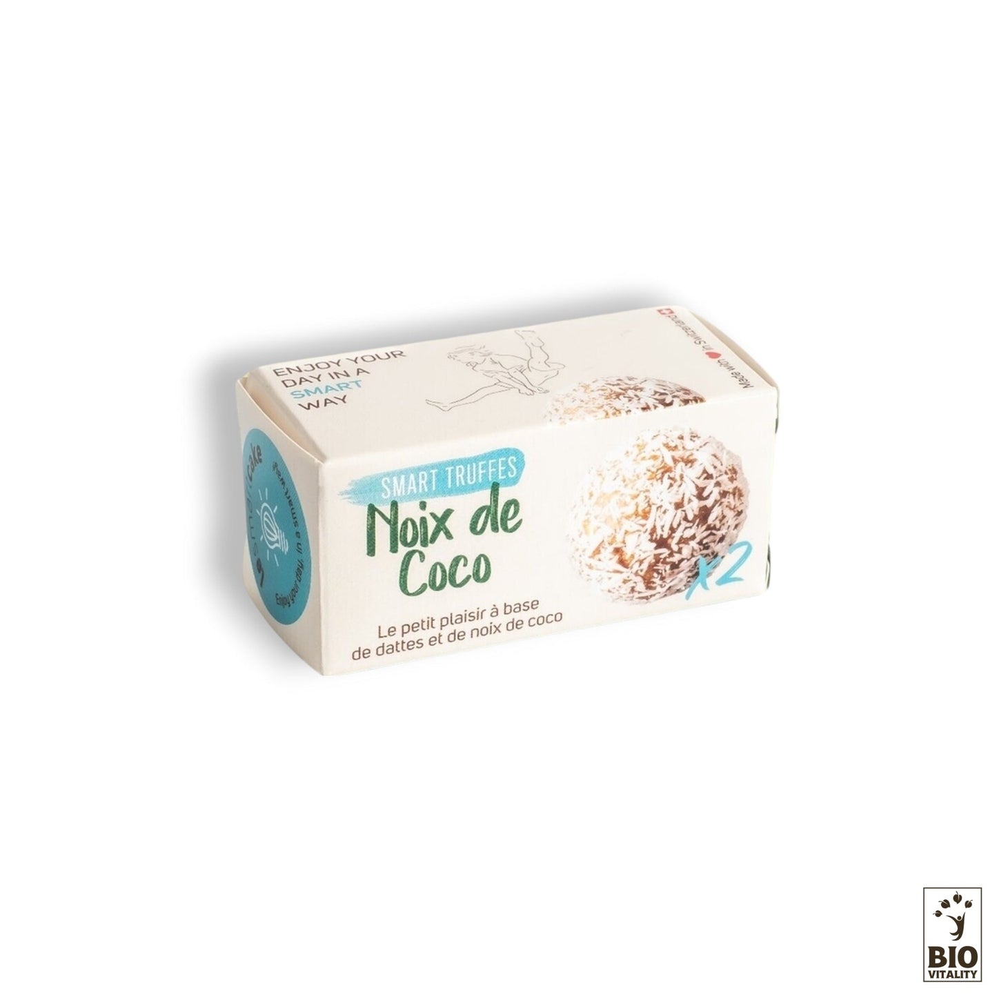 Le coffret est une petite boîte rectangulaire de Smart Truffes Noix de Coco - 2 pièces de LE SMART CAKE, ornée dun motif de noix de coco et étiquetée en français. Le logo Bio Vitality en bas à droite met en valeur ses ingrédients biologiques pour une essence naturelle.