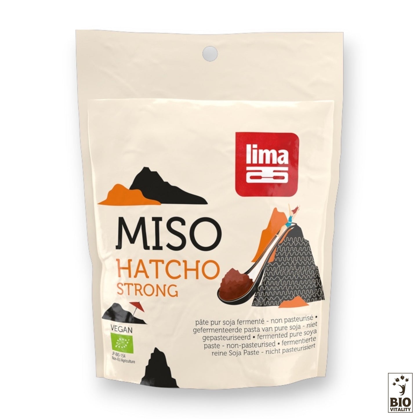 Un paquet de 300 g de Hatcho Miso Soja Bio de LIMA, orné dun graphisme de montagne et dune étiquette vegan, met en valeur son processus de fermentation artisanale.