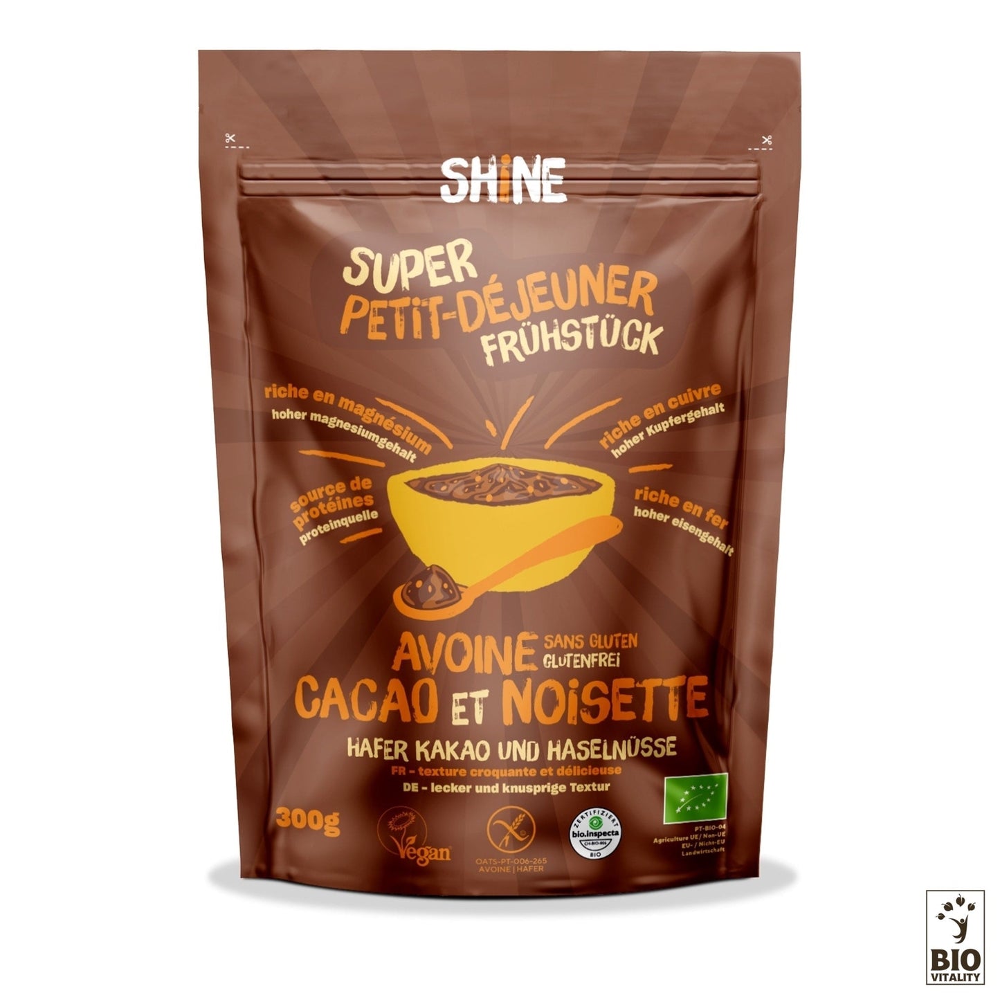 Lemballage brun de lAvoine Cacao cru et Noisette de SHINE (300 g) met en valeur les caractéristiques sans gluten, riches en fibres et végétaliennes. Il contient des flocons davoine pour une alimentation saine et est certifié BIO.